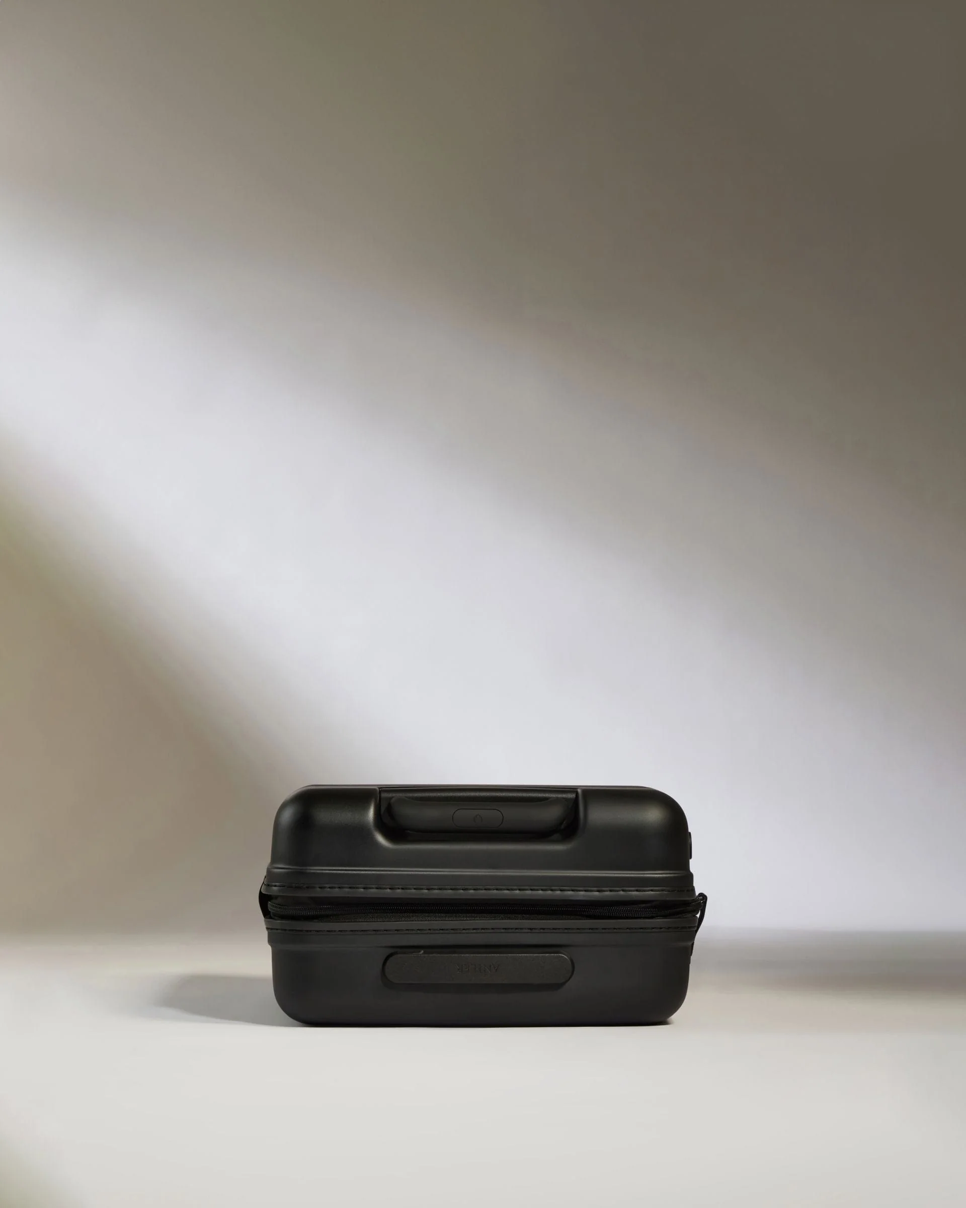 Cabin Suitcase in Black - Icon Stripe - Image 4