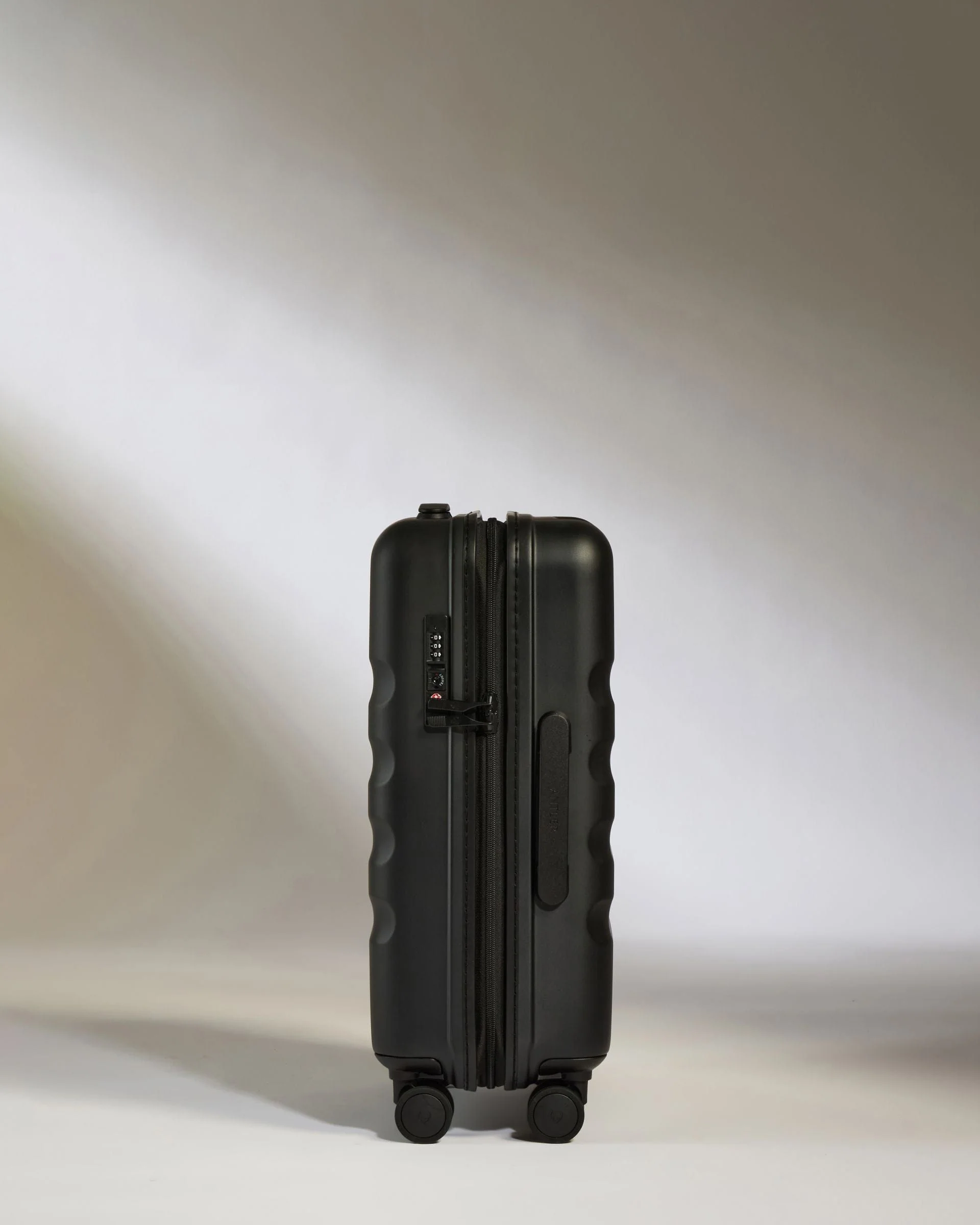 Cabin Suitcase in Black - Icon Stripe - Image 5