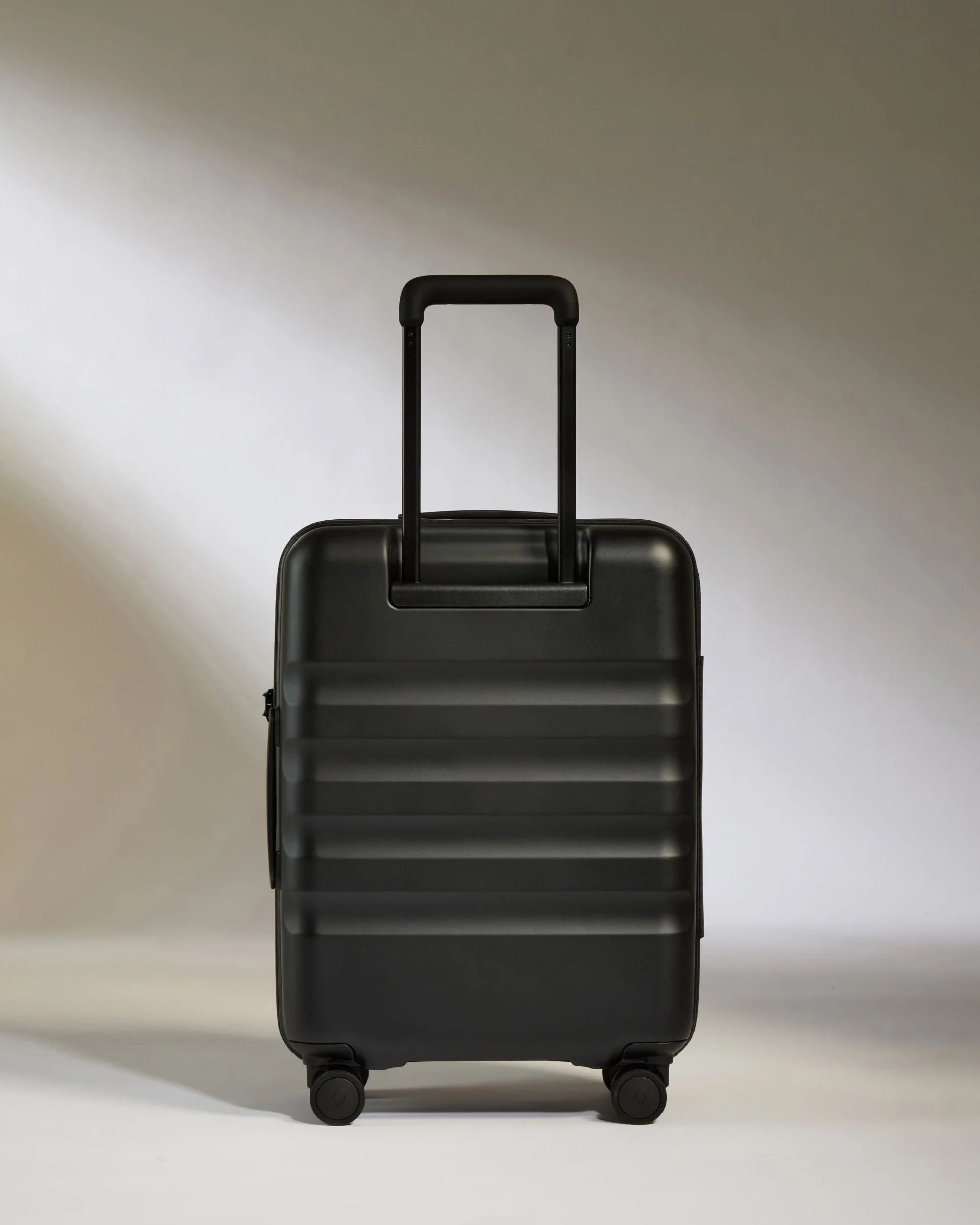 Cabin Suitcase in Black - Icon Stripe - Image 6