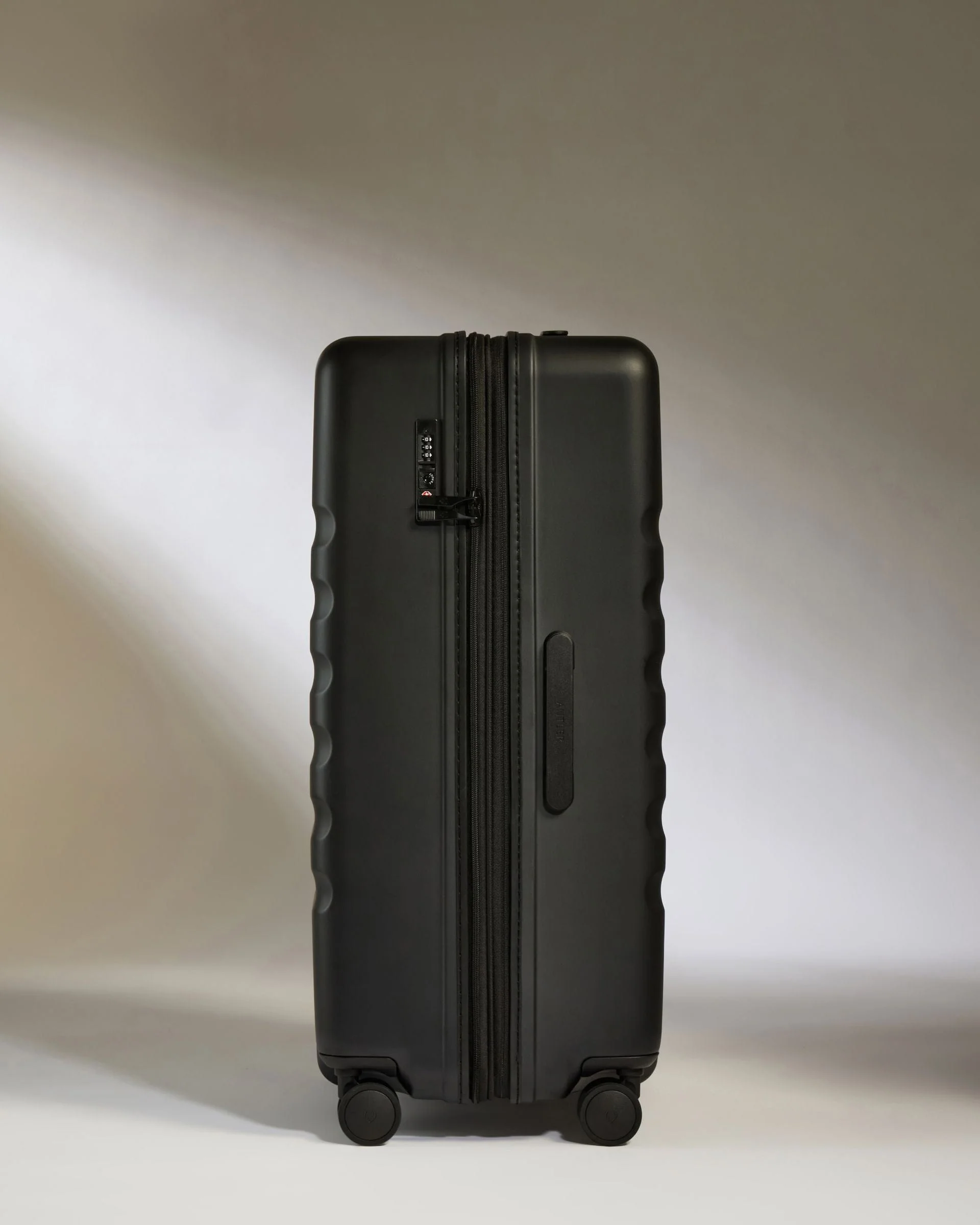 Large Suitcase in Black - Icon Stripe - Image 4
