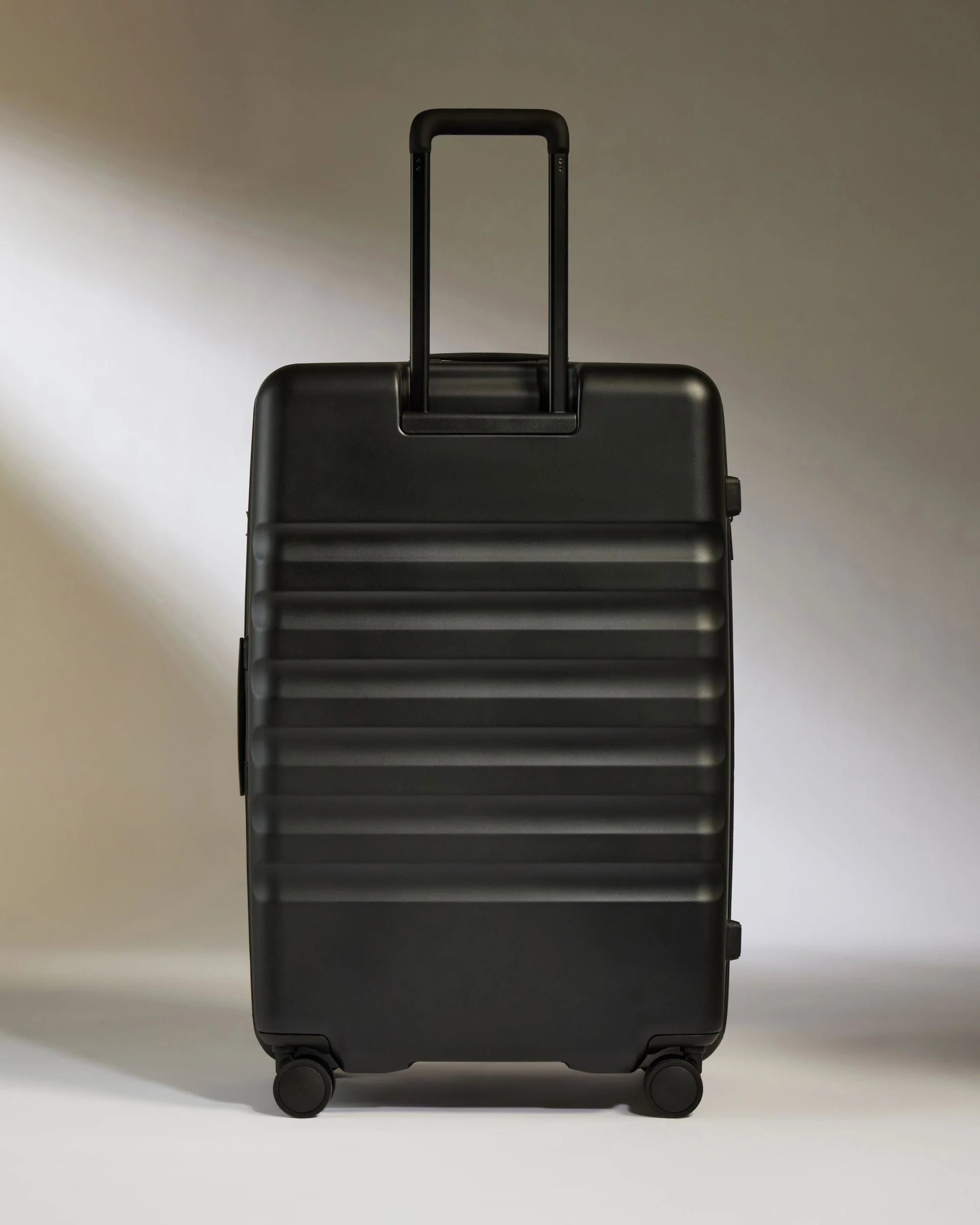 Large Suitcase in Black - Icon Stripe - Image 6