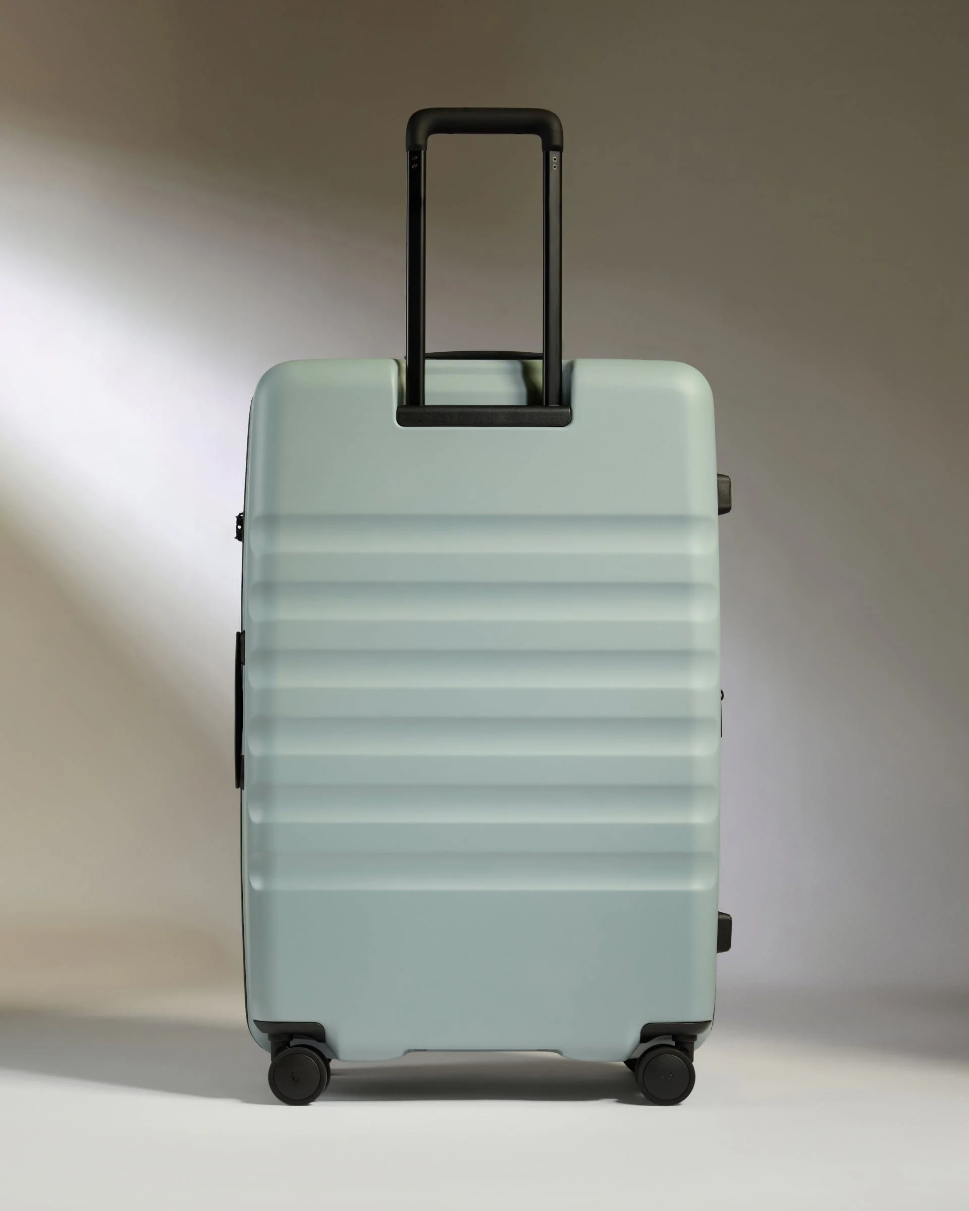 Large Suitcase in Mist Blue - Icon Stripe - Image 6
