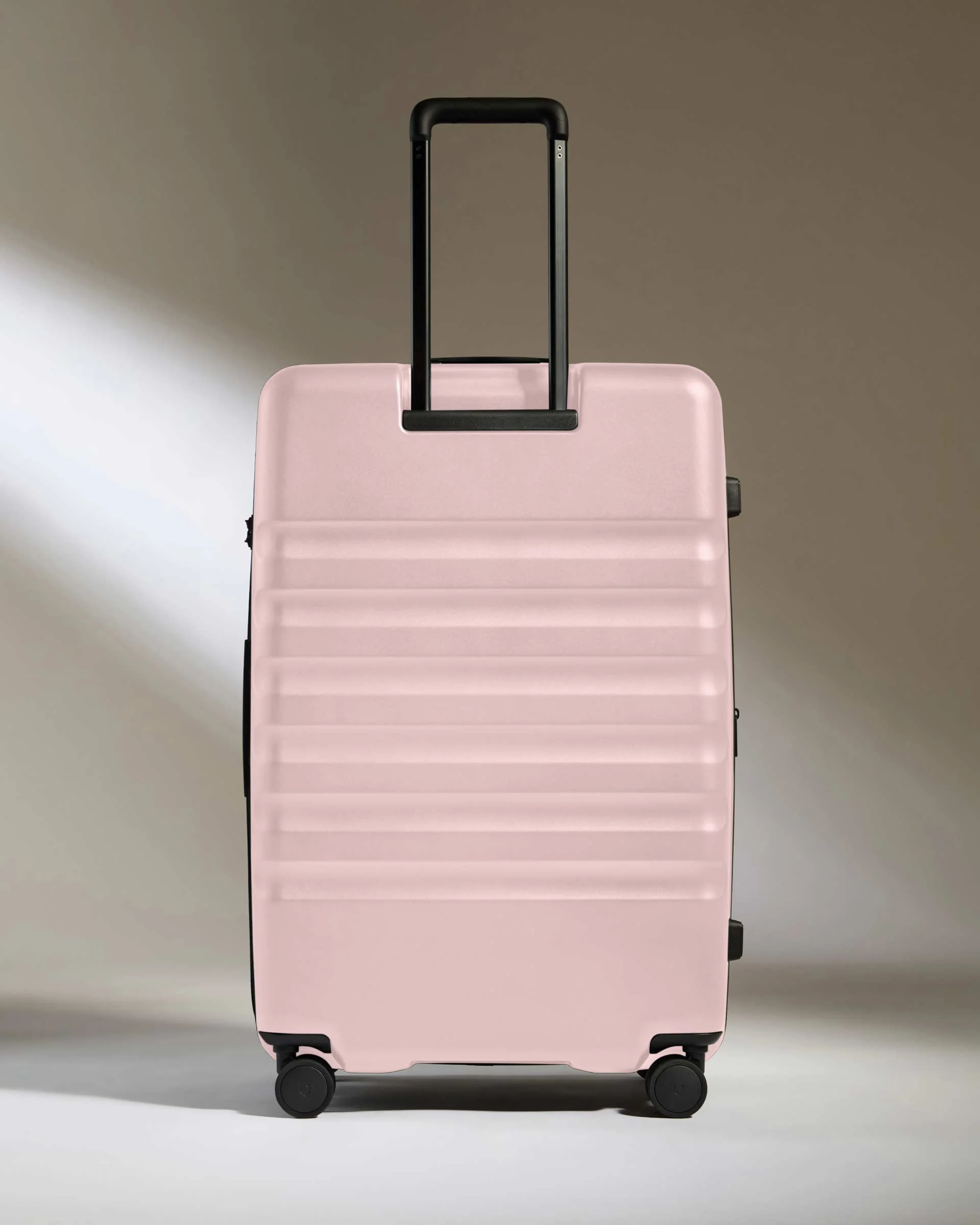 Large Suitcase in Moorland Pink - Icon Stripe - Image 6