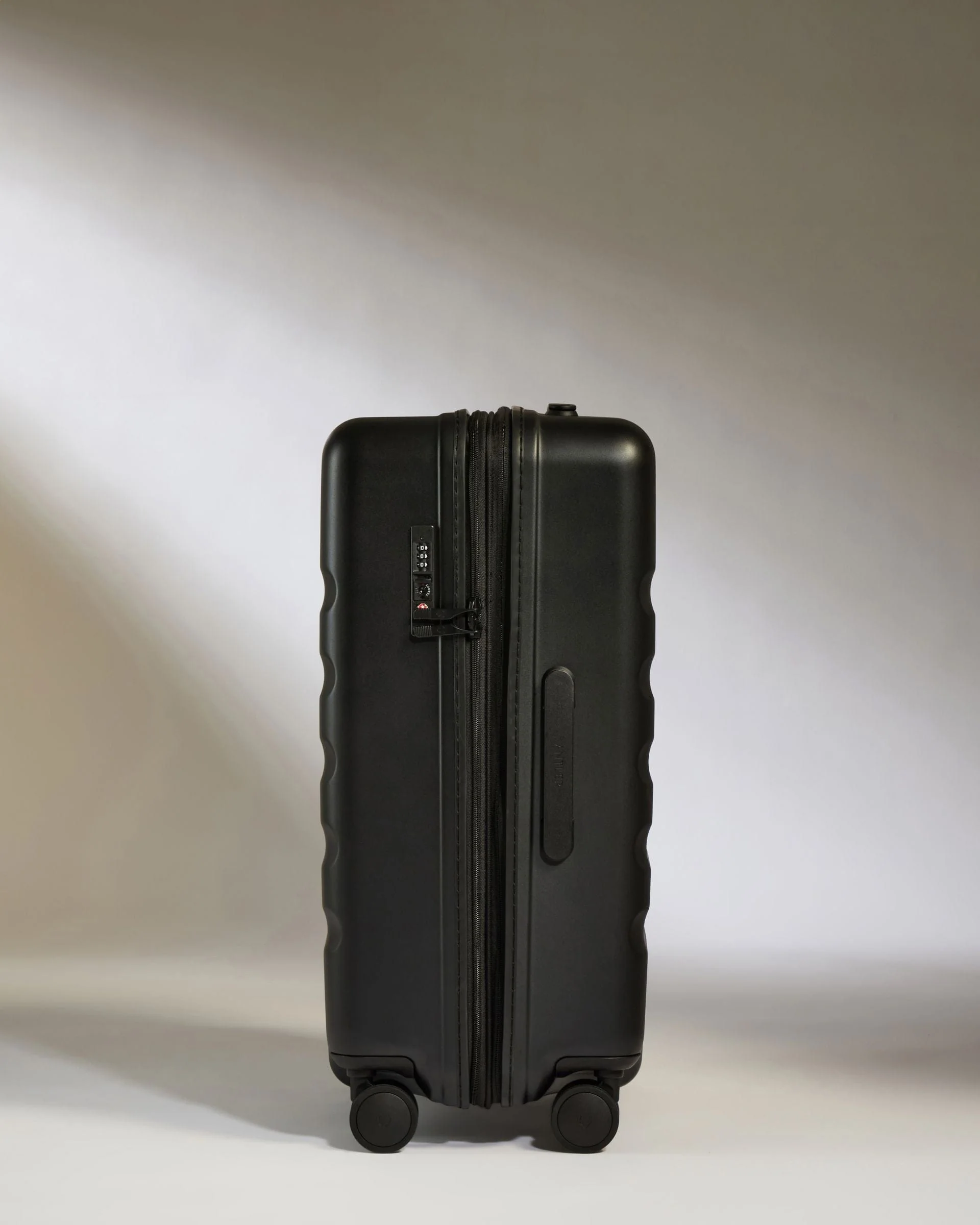 Medium Suitcase in Black - Icon Stripe - Image 4