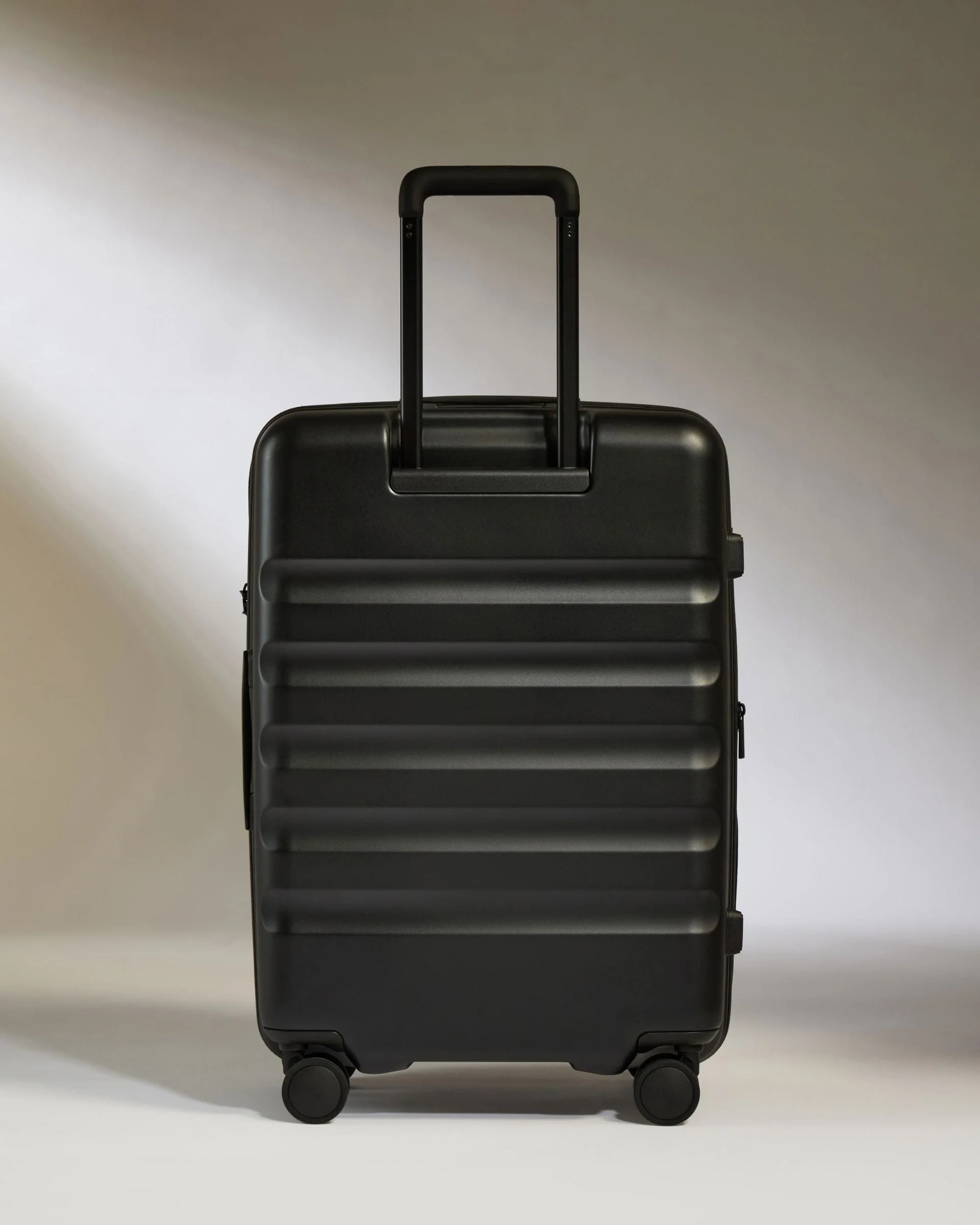Medium Suitcase in Black - Icon Stripe - Image 6