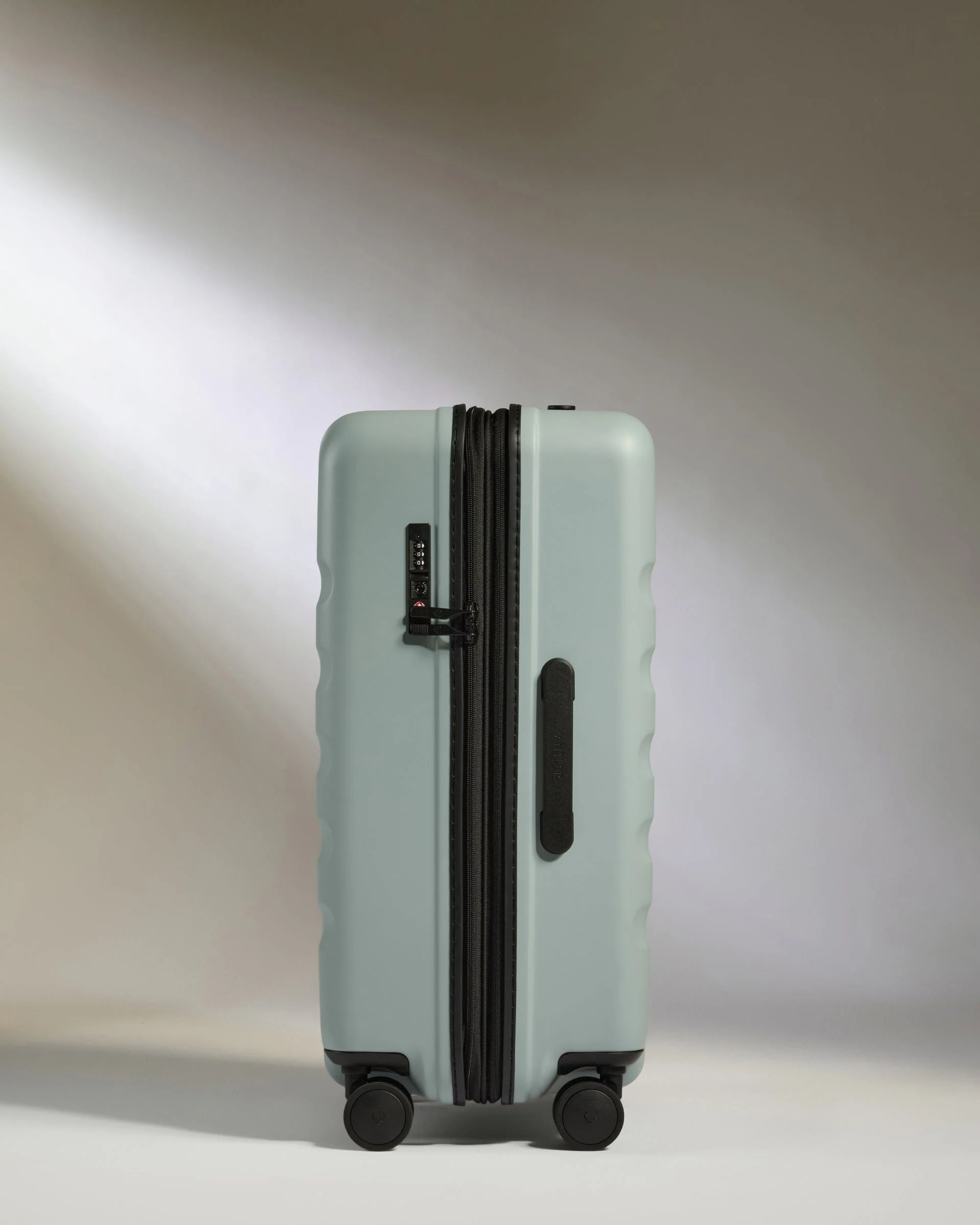 Medium Suitcase in Mist Blue - Icon Stripe - Image 4