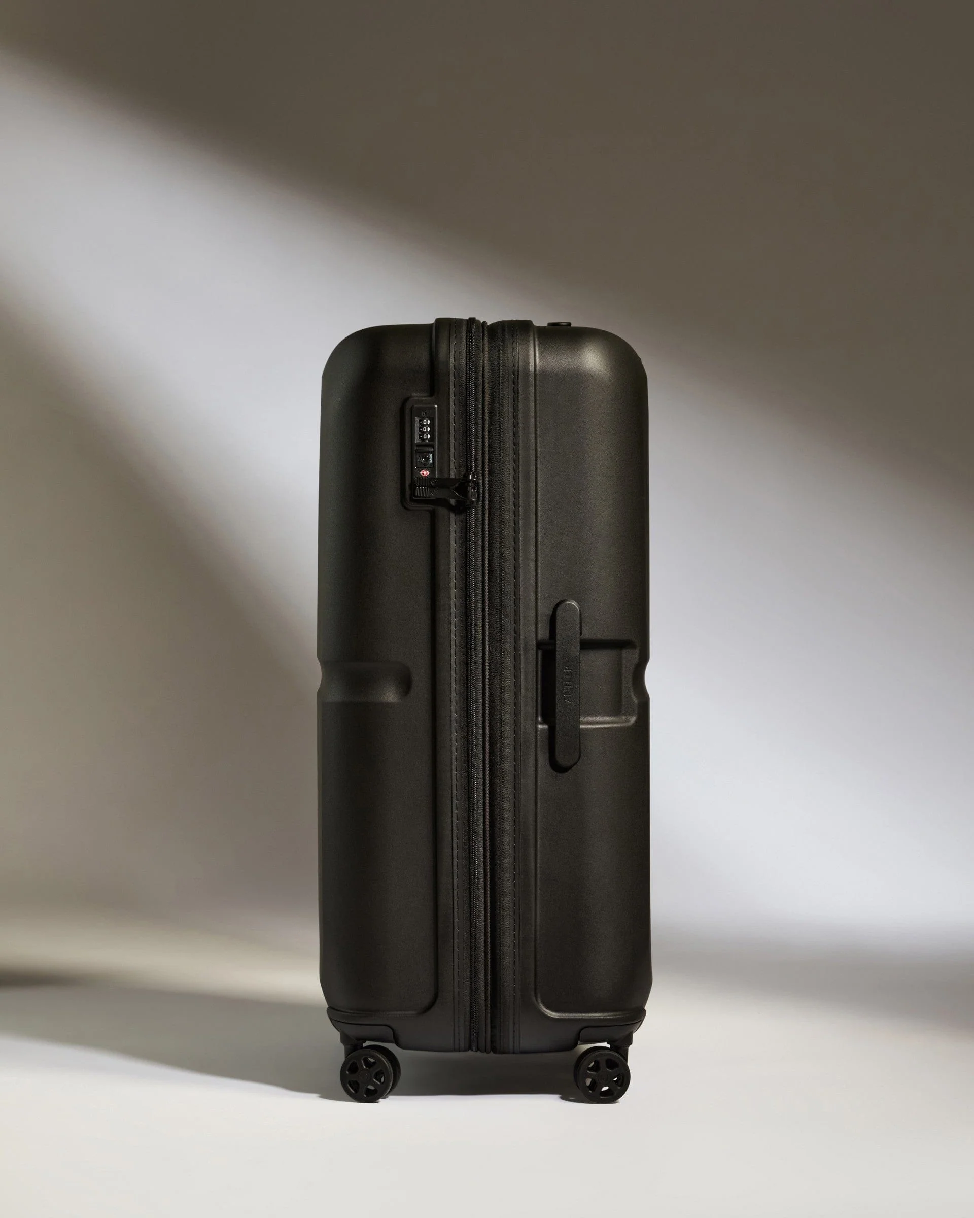Large Suitcase in Black - Single Stripe - Image 5