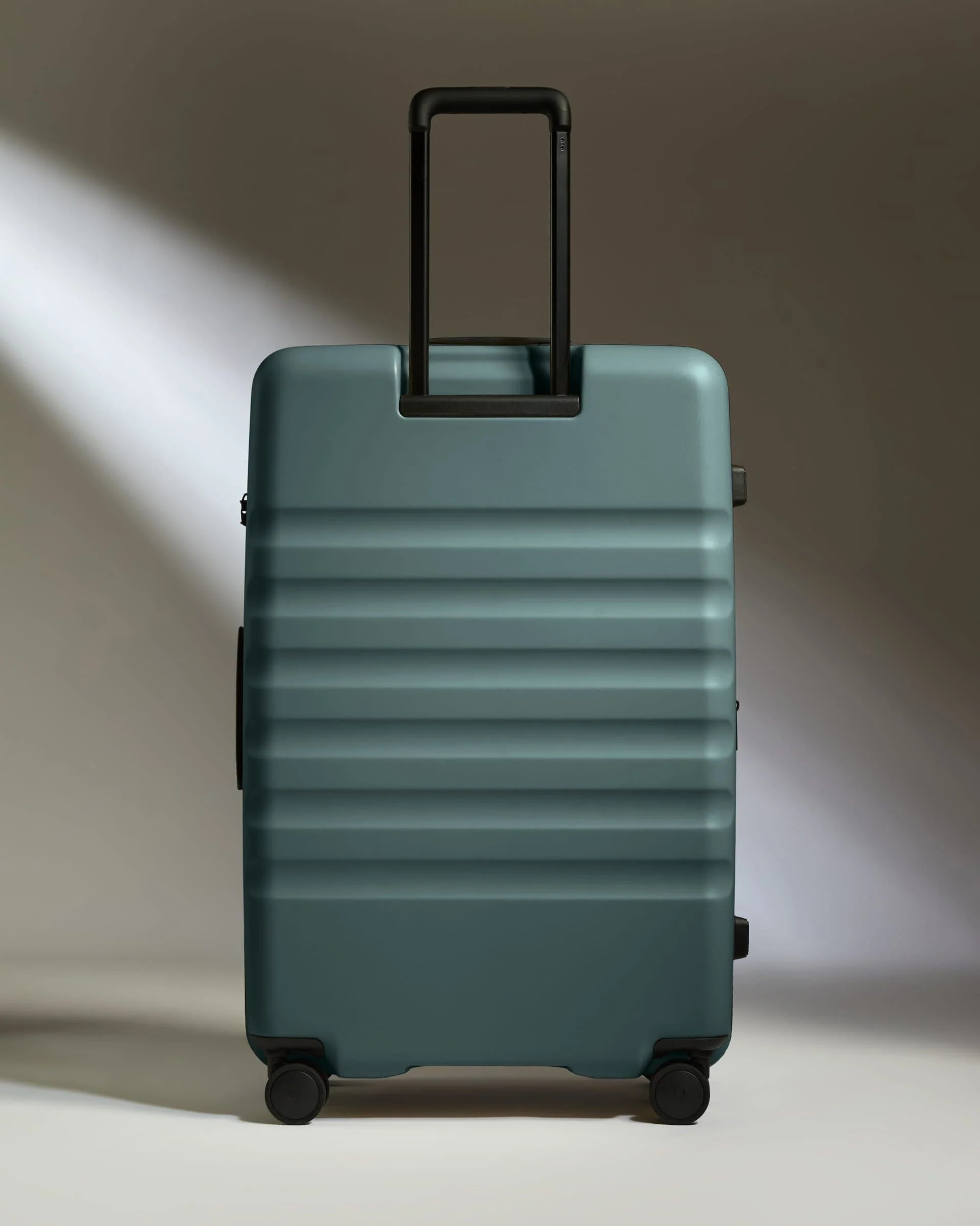 Large Suitcase in Glade Blue - Icon Stripe - Image 5