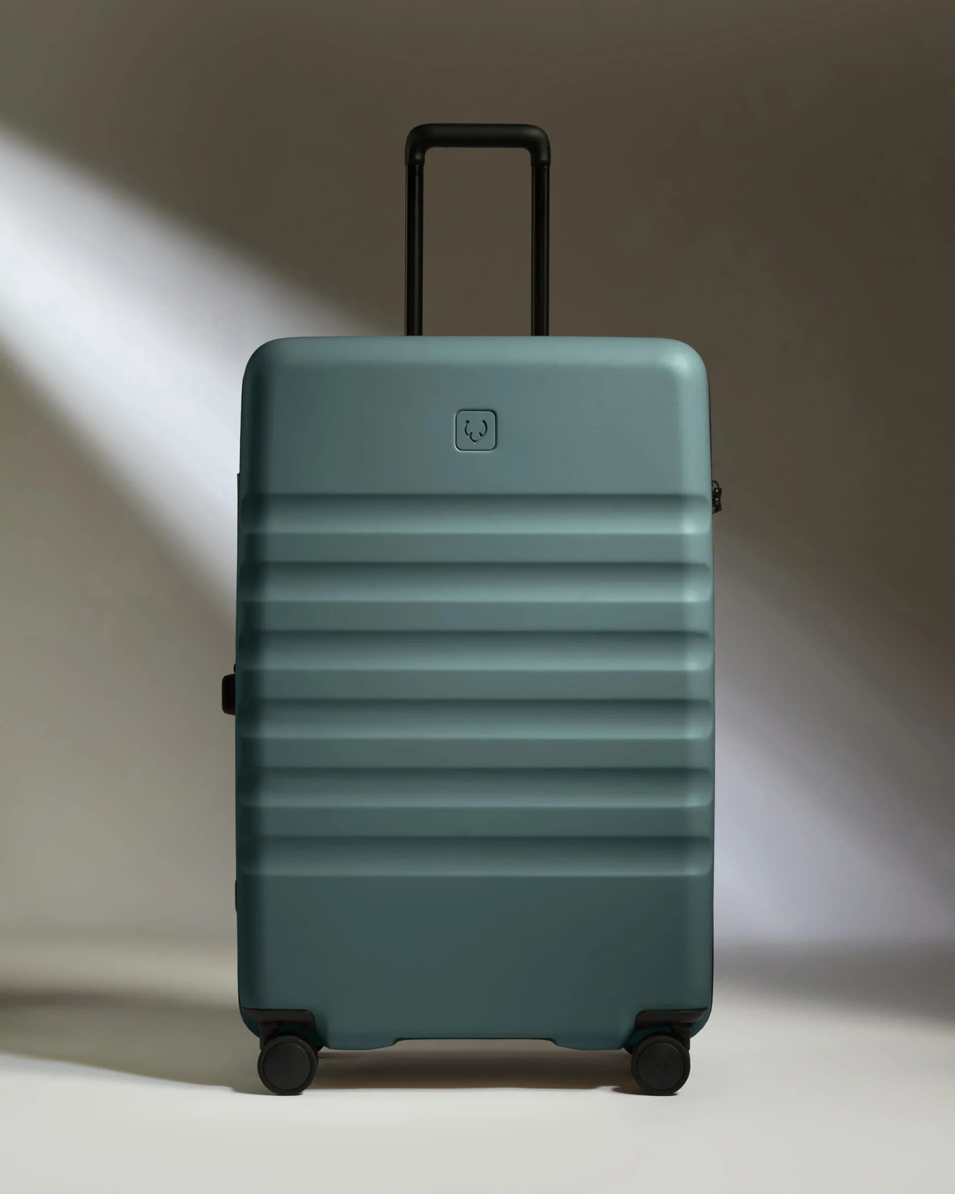 Large Suitcase in Glade Blue - Icon Stripe - Image 6