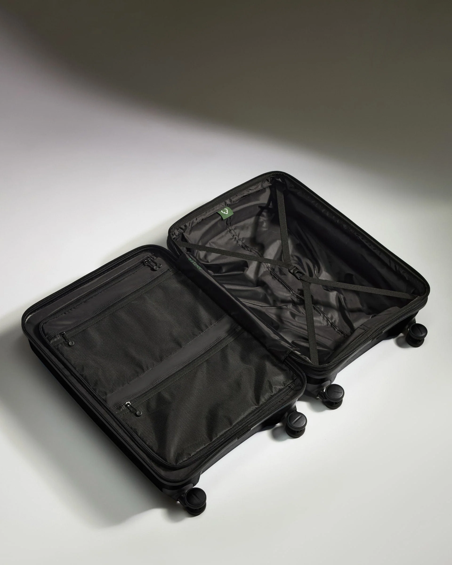 Medium Suitcase in Black - Logo Stripe - Image 3