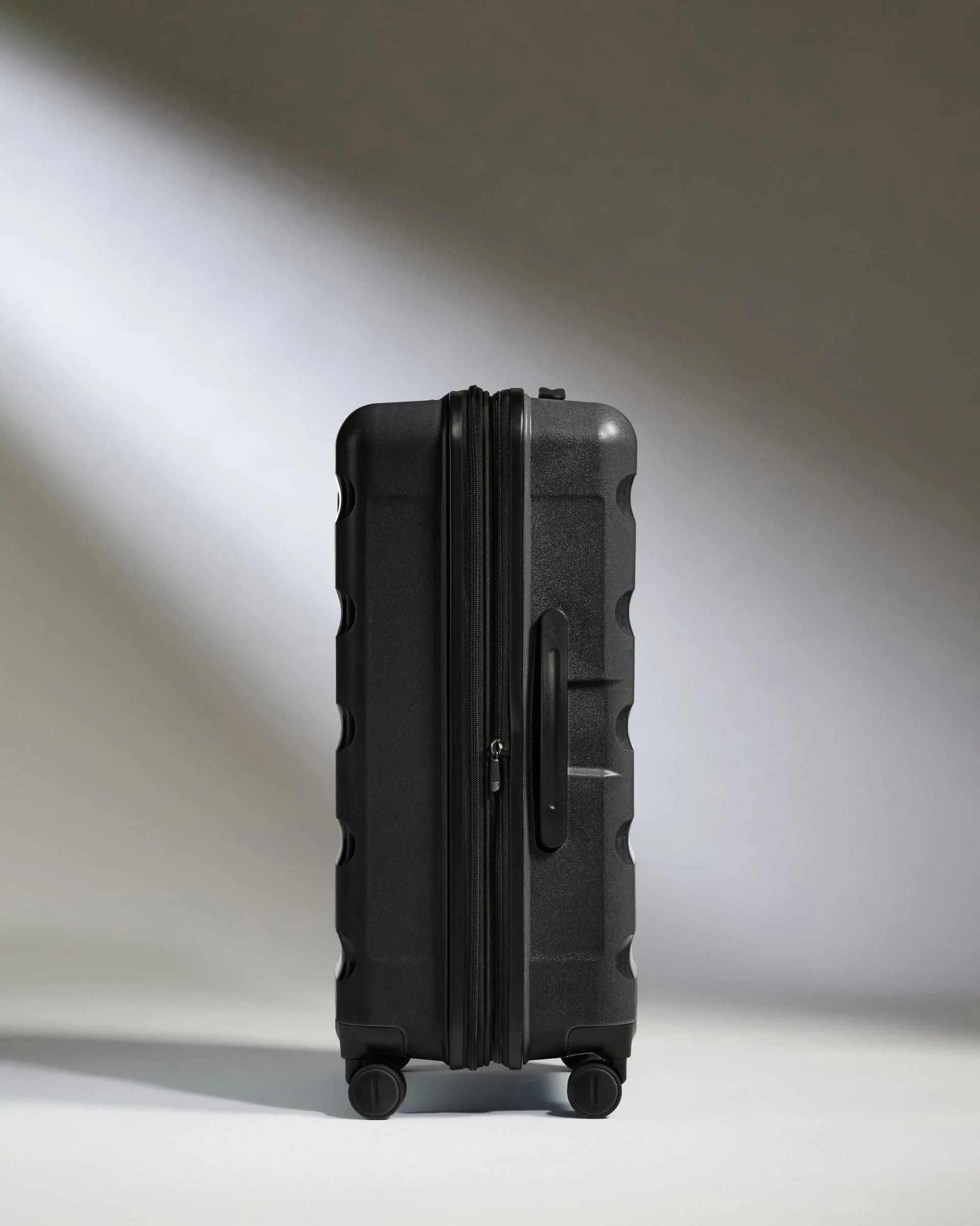 Medium Suitcase in Black - Logo Stripe - Image 4